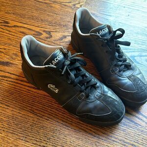 Lacoste black leather/suede lace up low top embroidered logo sneakers. Size 8